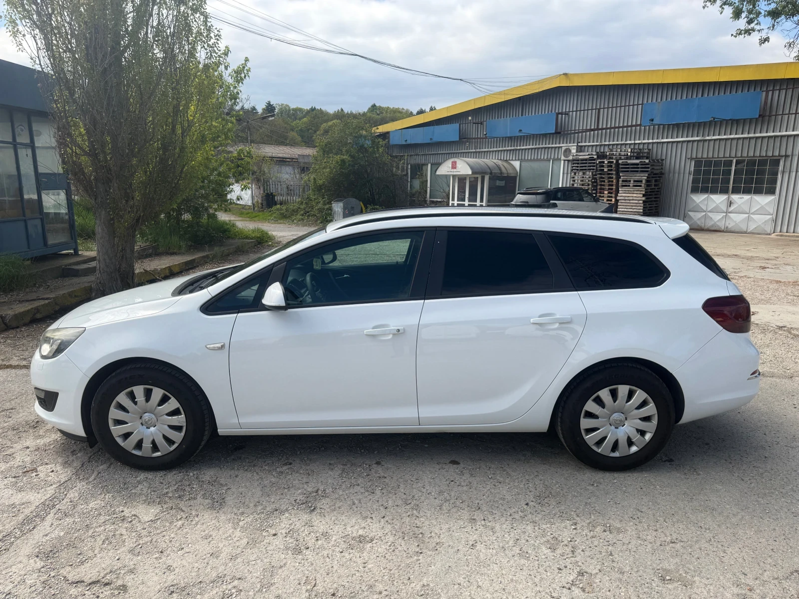 Opel Astra SPORT TOURER, снимка 7 - Автомобили и джипове - 54286474