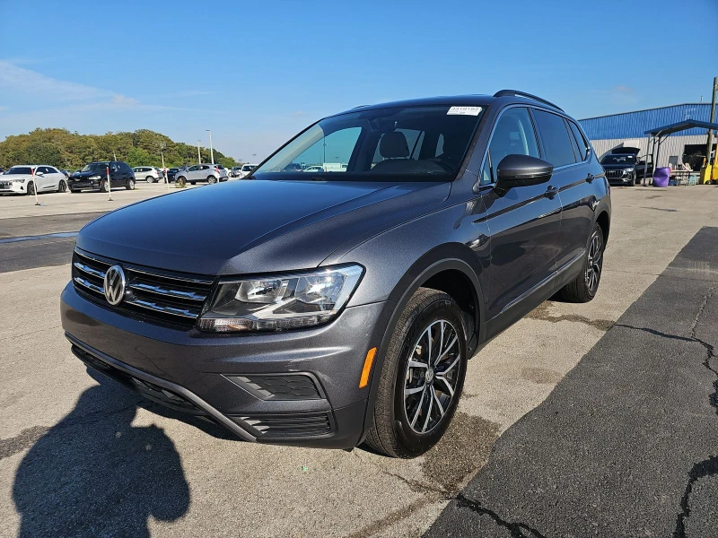 VW Tiguan 2.0T SE 4MOTION * 7 места * Бяла кожа, снимка 1 - Автомобили и джипове - 47704409