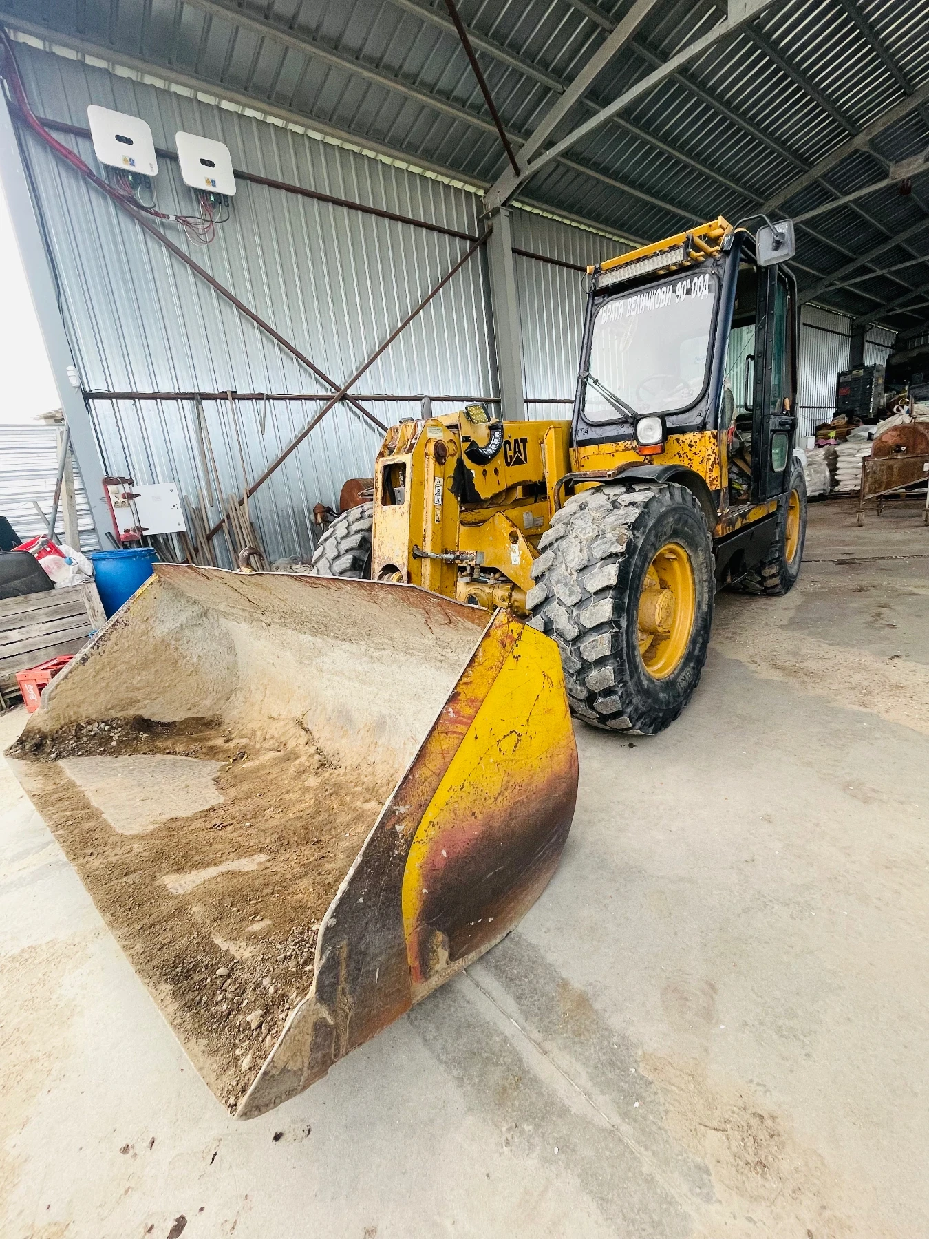 Телескопичен товарач Caterpillar CAT TH62. 6m - изображение 4