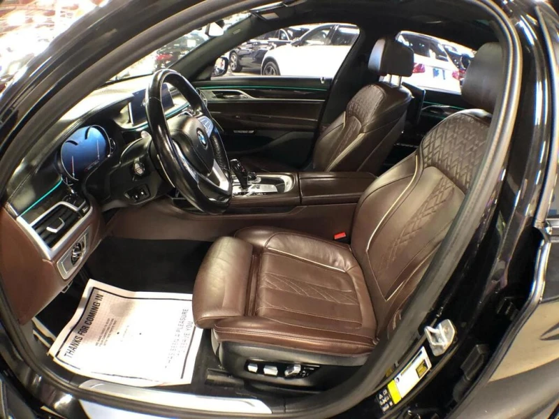 BMW 750 * АВТО КРЕДИТ* ЦЕНА ДО БГ * СЕРВИЗНА ИСТОРИЯ * , снимка 10 - Автомобили и джипове - 52786696