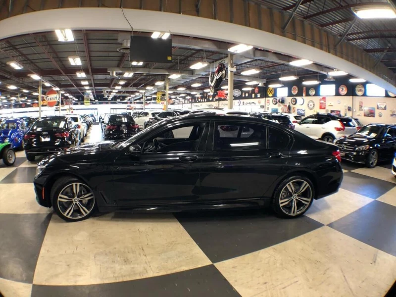 BMW 750 * АВТО КРЕДИТ* ЦЕНА ДО БГ * СЕРВИЗНА ИСТОРИЯ * , снимка 4 - Автомобили и джипове - 52786696