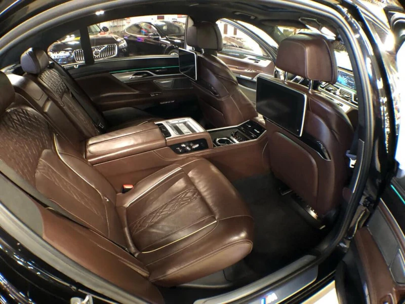 BMW 750 * АВТО КРЕДИТ* ЦЕНА ДО БГ * СЕРВИЗНА ИСТОРИЯ * , снимка 14 - Автомобили и джипове - 52786696