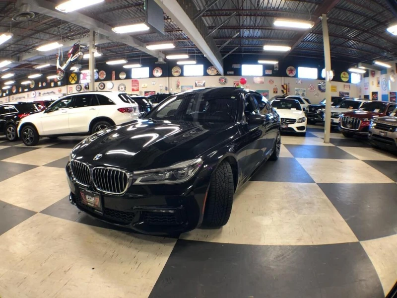 BMW 750 * АВТО КРЕДИТ* ЦЕНА ДО БГ * СЕРВИЗНА ИСТОРИЯ * , снимка 3 - Автомобили и джипове - 52786696