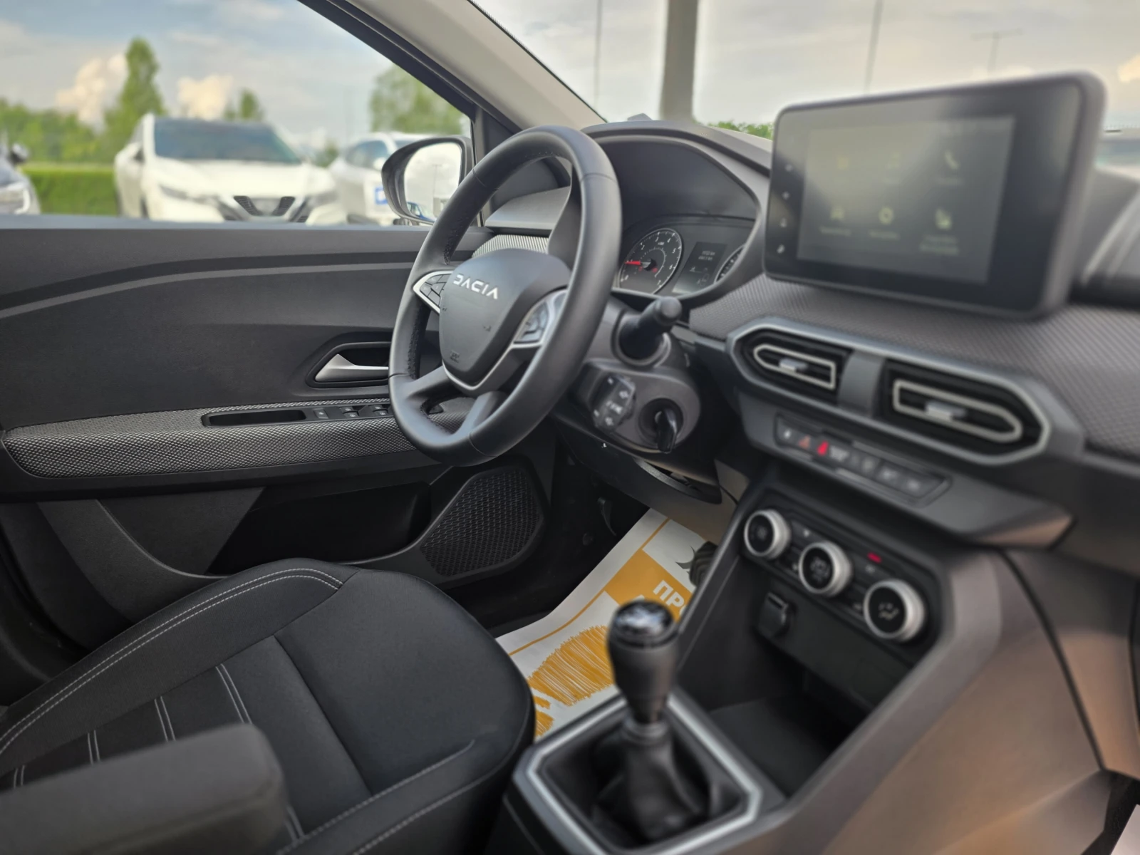 Dacia Logan 1.0TCe, снимка 14 - Автомобили и джипове - 55135397