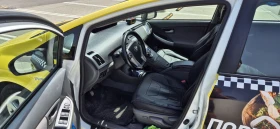 Toyota Prius 1.8 Hybrid 135к.с., снимка 8
