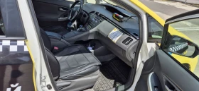 Toyota Prius 1.8 Hybrid 135к.с., снимка 9