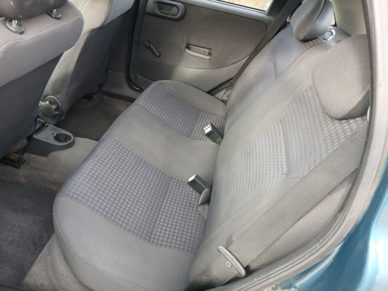 Opel Corsa 1.2клима , снимка 7 - Автомобили и джипове - 52997700