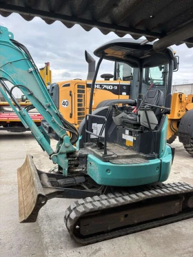 Багер Kobelco SX35SR