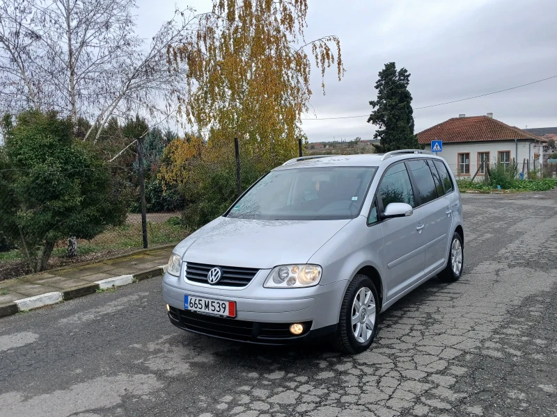 VW Touran 2.0i 7местен , снимка 1 - Автомобили и джипове - 47965673