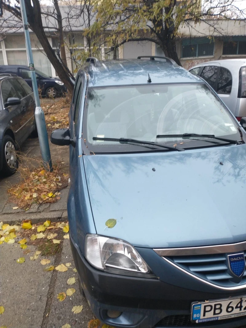 Dacia Logan, снимка 8 - Автомобили и джипове - 48226305