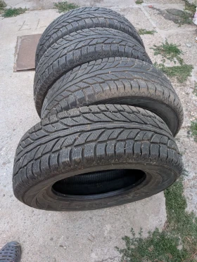 Гуми Зимни 215/70R16, снимка 14