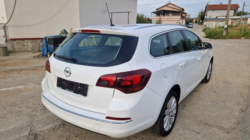 Opel Astra Sports Tourer , снимка 7 - Автомобили и джипове - 51524308