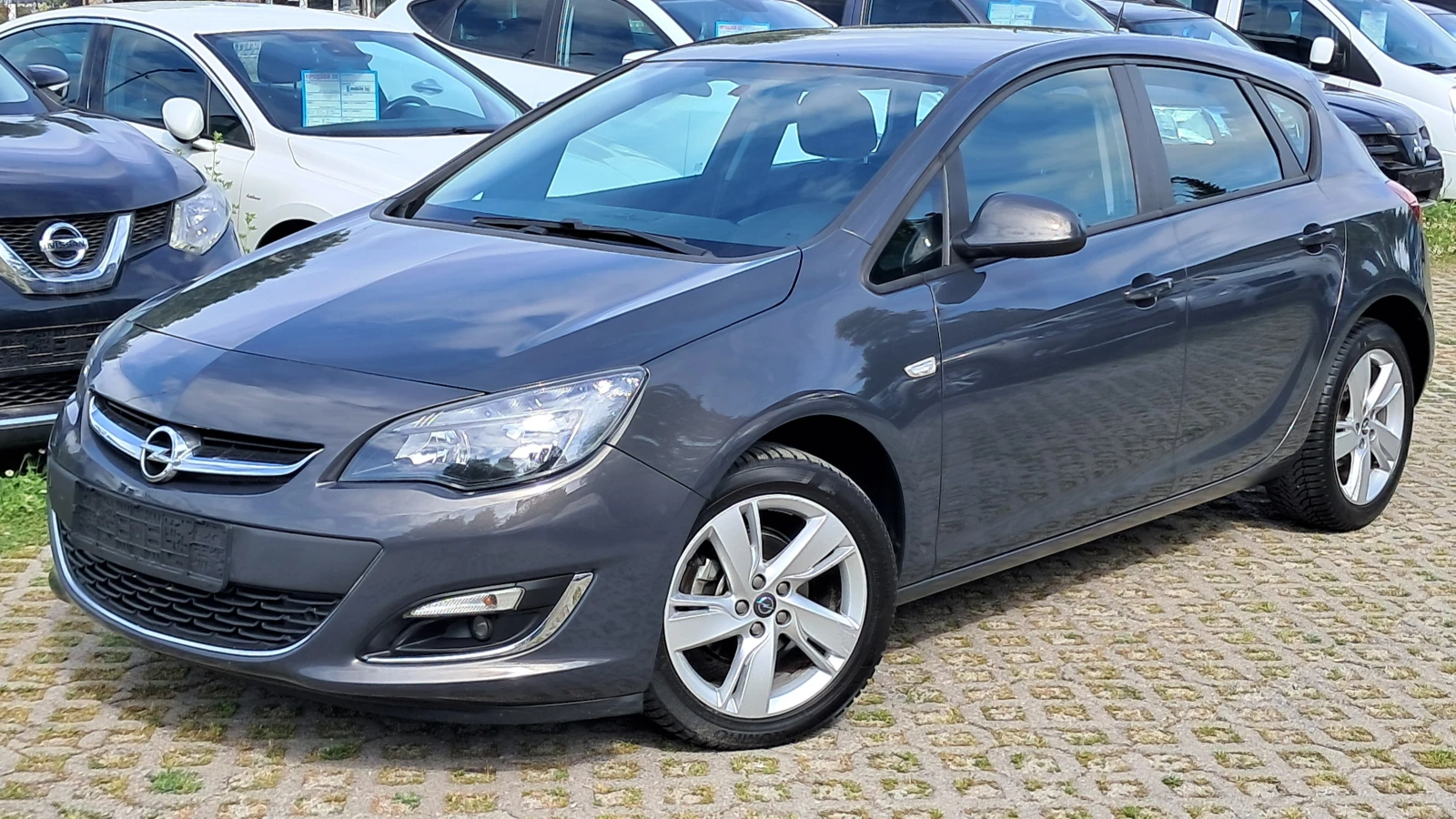 Opel Astra 1.4i ФЕЙС РЕАЛ КМ ИЗКЛЮЧИТЕЛНА СЕРВИЗ КНИЖК УНИКАТ, снимка 2 - Автомобили и джипове - 24106716