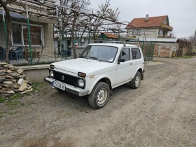 Lada Niva 1.7i 4x4 82 к.с, снимка 1 - Автомобили и джипове - 44621480