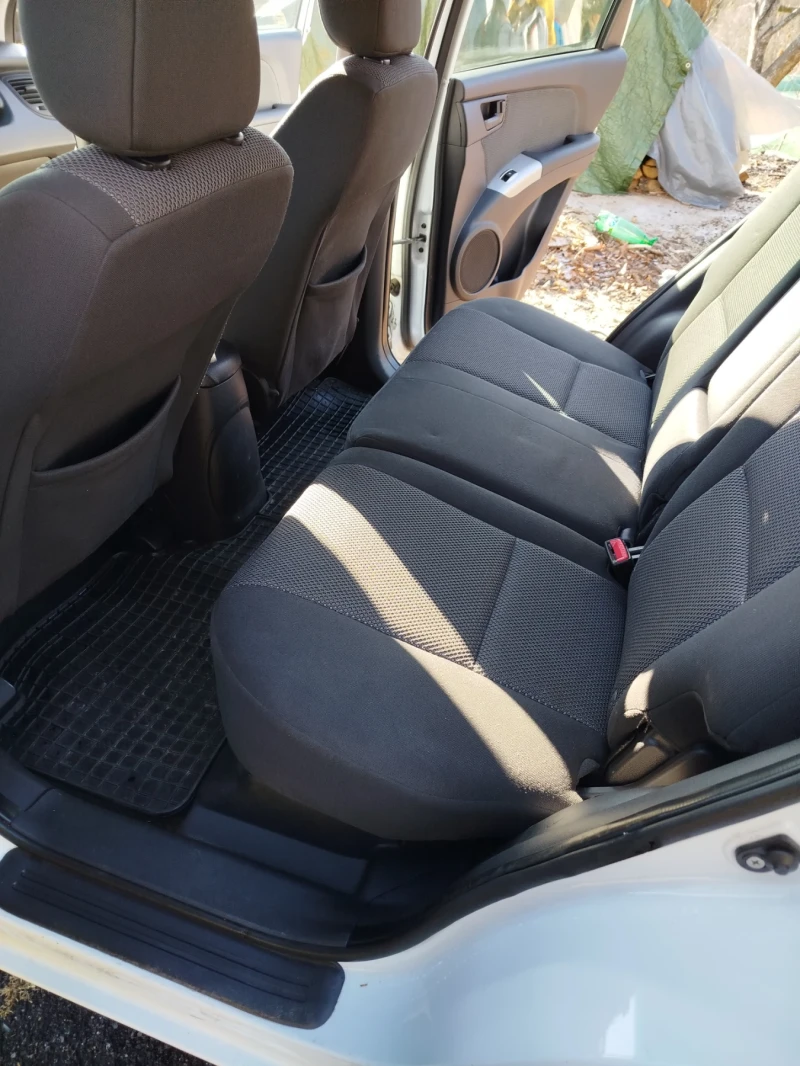 Kia Sportage, снимка 12 - Автомобили и джипове - 53173682