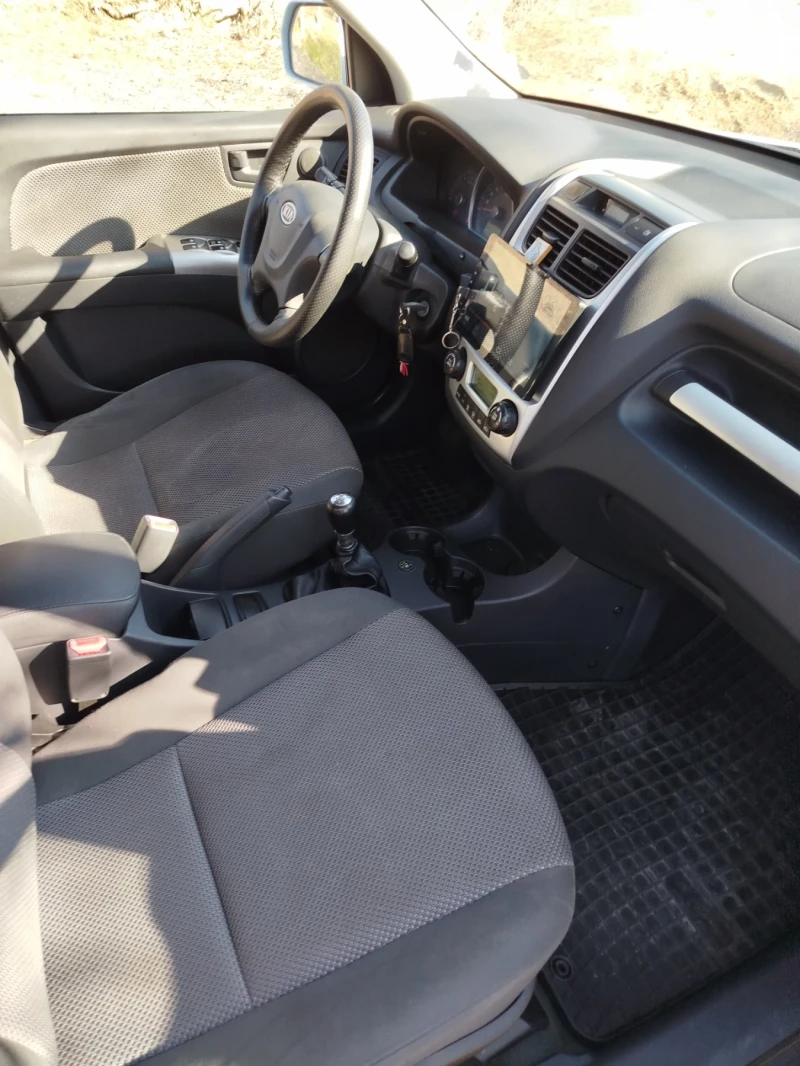 Kia Sportage, снимка 6 - Автомобили и джипове - 53173682