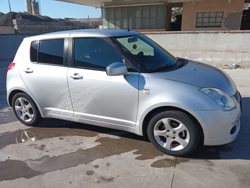 Suzuki Swift 1.3 , снимка 1 - Автомобили и джипове - 48746573