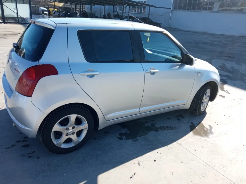 Suzuki Swift 1.3 , снимка 7 - Автомобили и джипове - 48746573