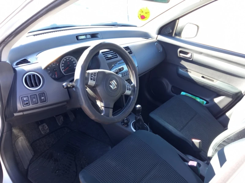 Suzuki Swift 1.3 , снимка 9 - Автомобили и джипове - 48746573