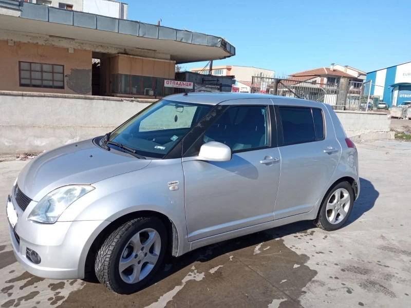 Suzuki Swift 1.3 , снимка 4 - Автомобили и джипове - 48746573