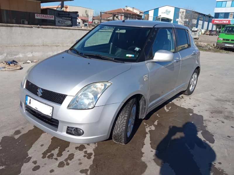 Suzuki Swift 1.3 , снимка 5 - Автомобили и джипове - 48746573