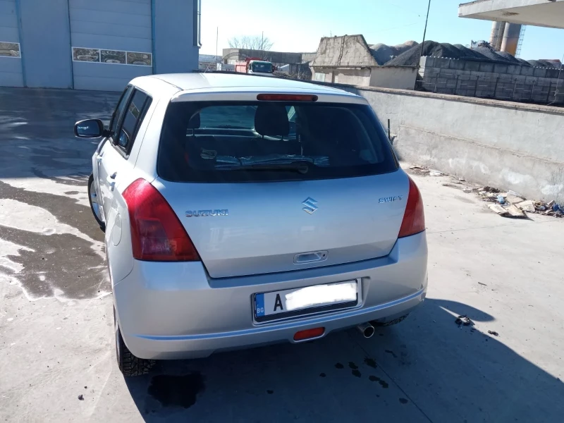 Suzuki Swift 1.3 , снимка 6 - Автомобили и джипове - 48746573