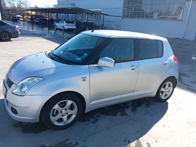 Suzuki Swift 1.3 , снимка 12 - Автомобили и джипове - 48746573