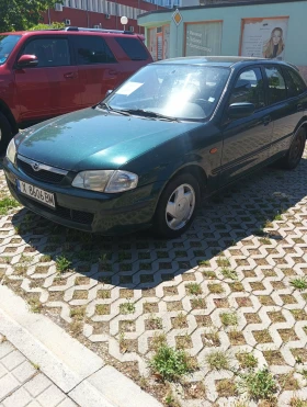 Mazda 323, снимка 1