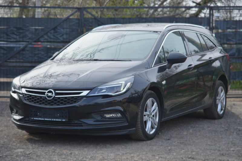 Opel Astra 1.4 Turbo / Автомат / CarPlay / Камера , снимка 1 - Автомобили и джипове - 47234072