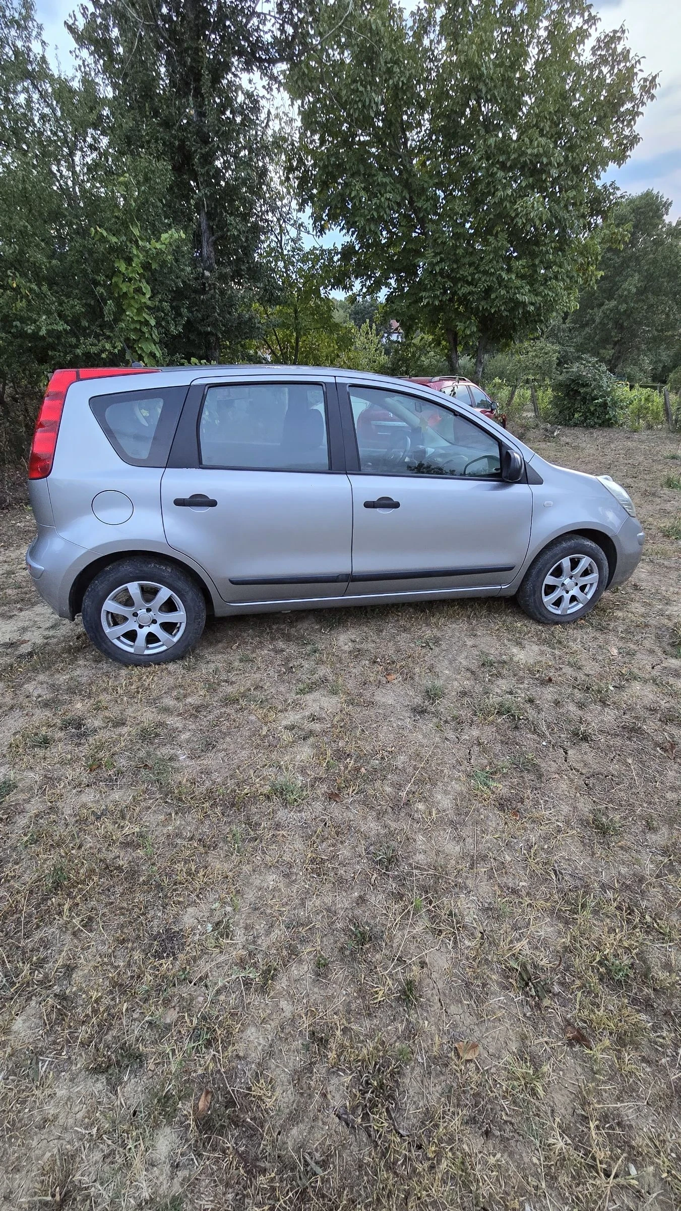 Nissan Note 1.4 бензин 88 к.с - изображение 4