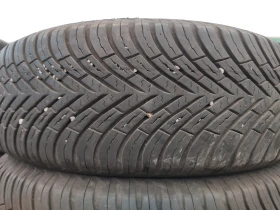 Гуми Всесезонни 185/65R15, снимка 1 - Гуми и джанти - 48959411