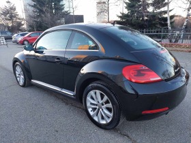 VW New beetle 1,6TDI 105ps NAVI | Mobile.bg    5