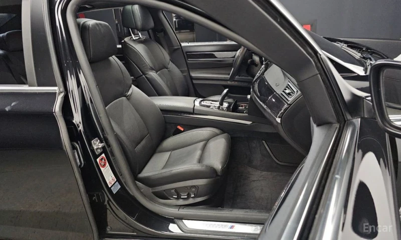 BMW 750, снимка 12 - Автомобили и джипове - 52805656