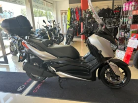     Yamaha X-max 300cc.