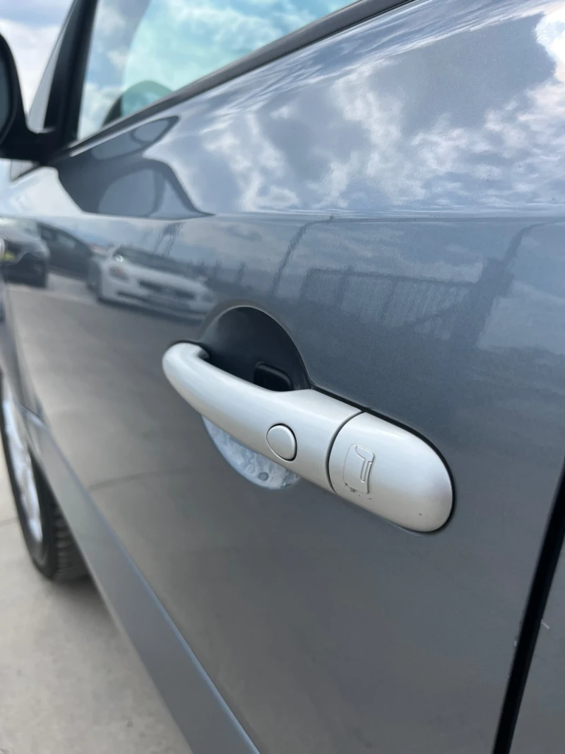 Renault Koleos 2.0 dCi 4x4, снимка 14 - Автомобили и джипове - 49846442