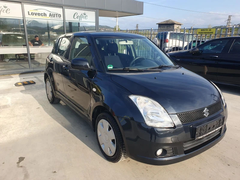 Suzuki Swift 1.3 4X4, снимка 6 - Автомобили и джипове - 49944117