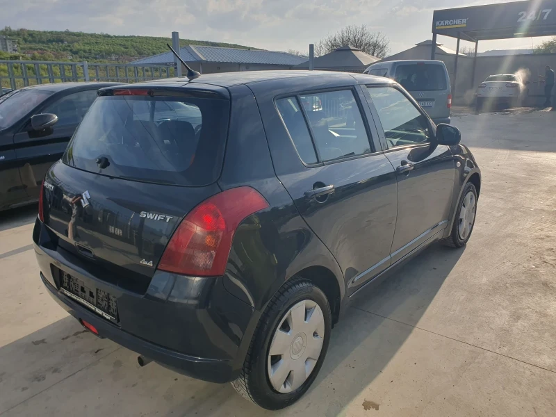 Suzuki Swift 1.3 4X4, снимка 5 - Автомобили и джипове - 49944117