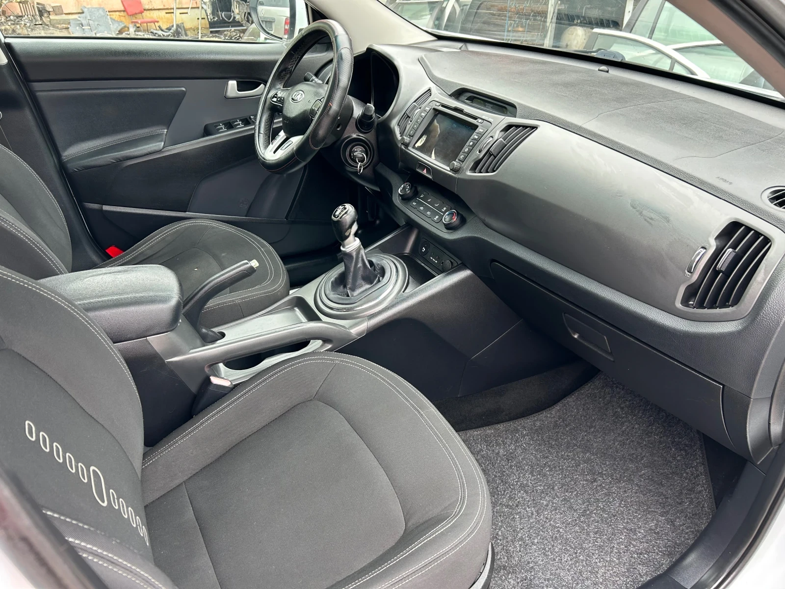 Kia Sportage 1.7 CRDI, снимка 10 - Автомобили и джипове - 54473700