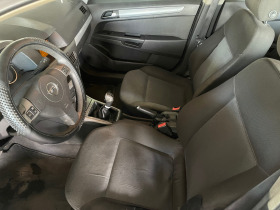 Opel Astra 1.6i ГАЗ КЛИМАТРОНИК 4ВРАТИ НОВИ ГУМИ, снимка 8