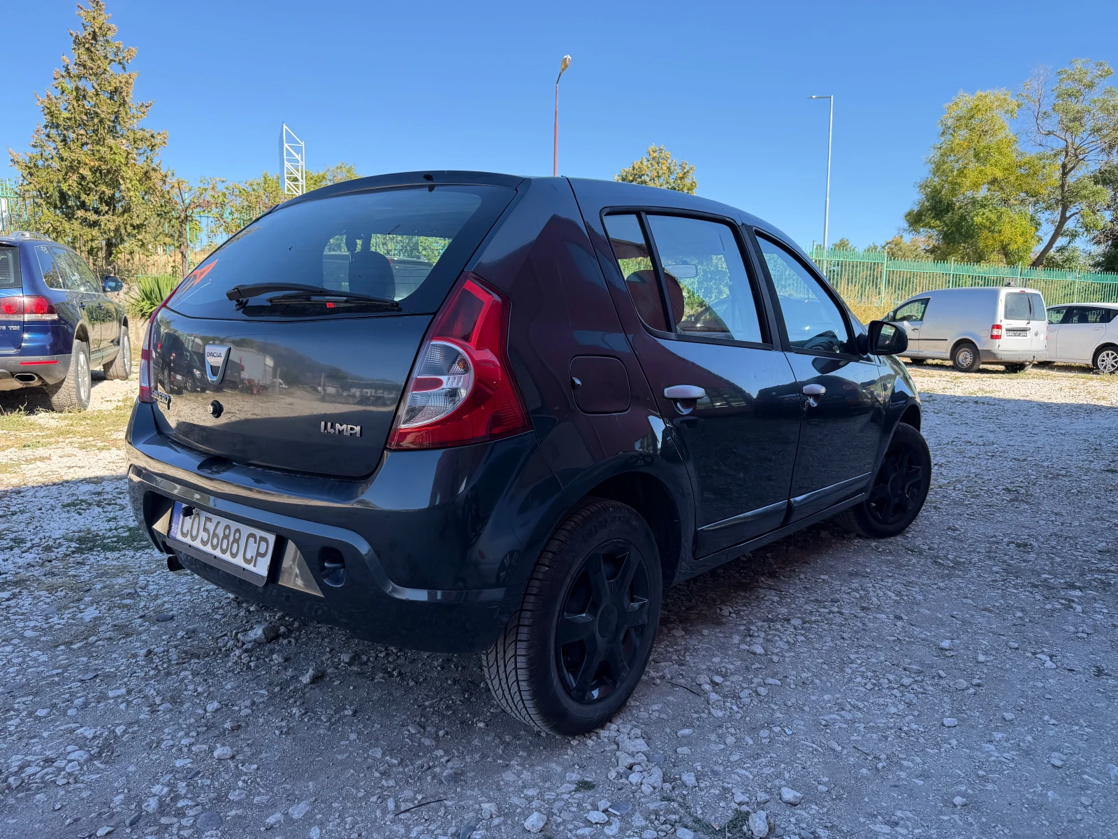 Dacia Sandero 1.4 ГАЗ КЛИМА, снимка 4 - Автомобили и джипове - 56359334