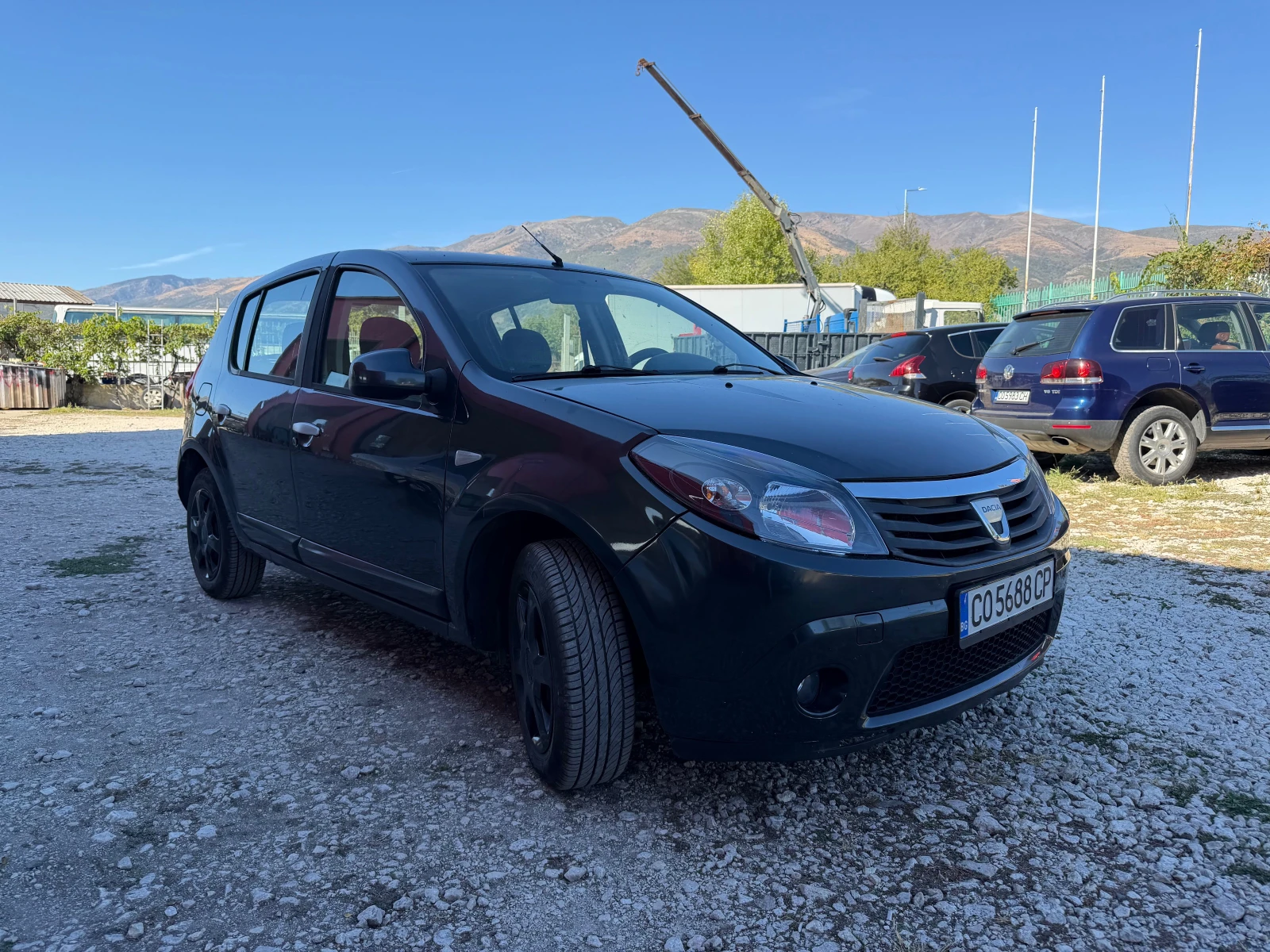 Dacia Sandero 1.4 ГАЗ КЛИМА, снимка 3 - Автомобили и джипове - 56359334