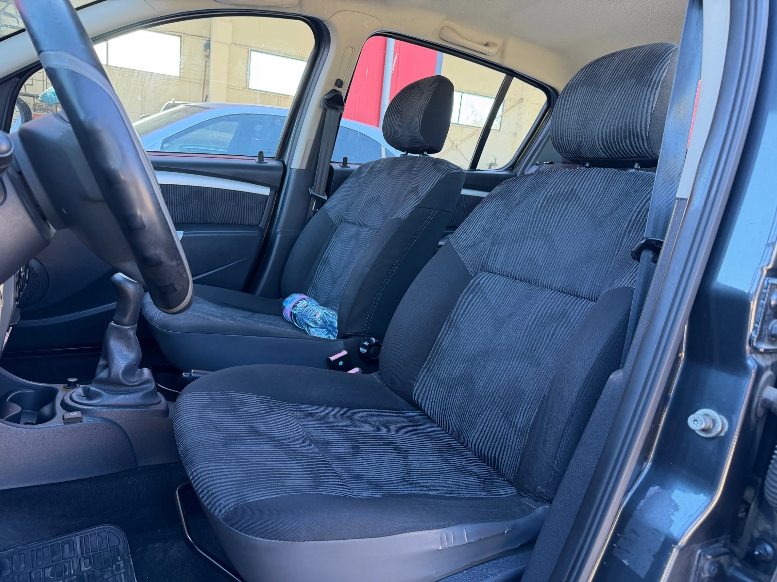 Dacia Sandero 1.4 ГАЗ КЛИМА, снимка 7 - Автомобили и джипове - 56359334