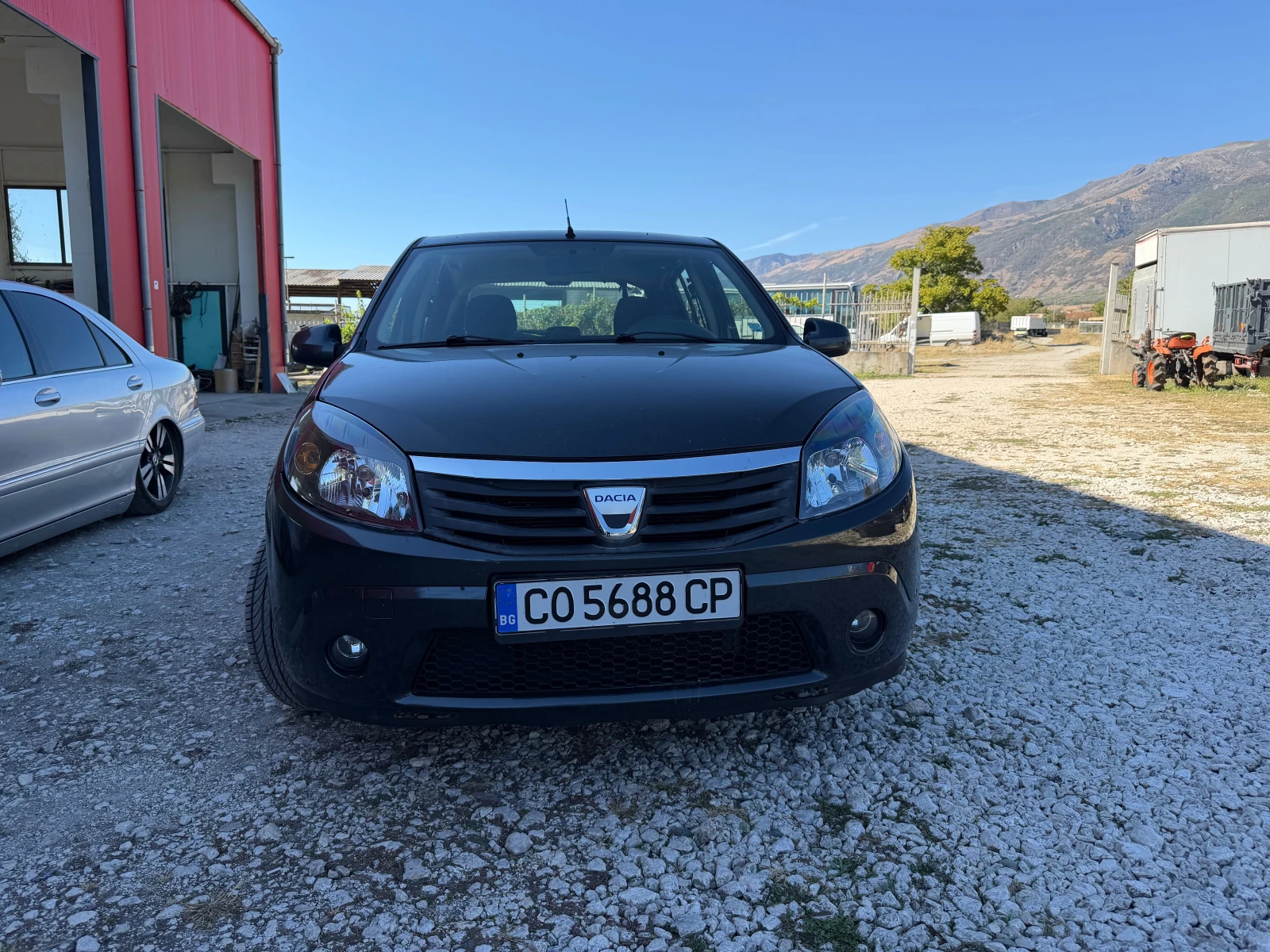 Dacia Sandero 1.4 ГАЗ КЛИМА, снимка 2 - Автомобили и джипове - 56359334