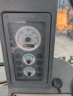 Багер Komatsu WB93R, снимка 6
