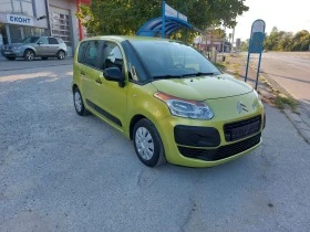     Citroen C3 Picasso 1.4i--64000.