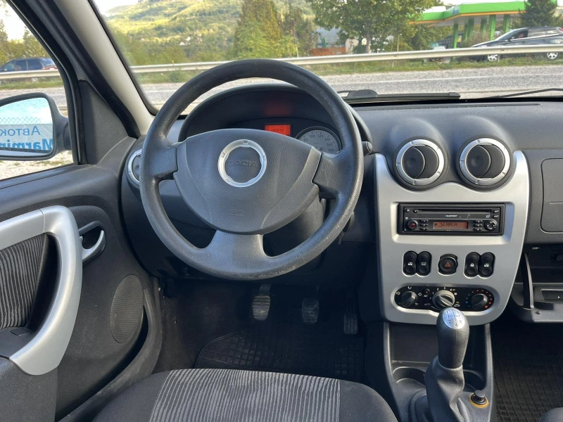 Dacia Sandero 1.4I 88кс EURO 4 КЛИМАТИК, снимка 12 - Автомобили и джипове - 47498267