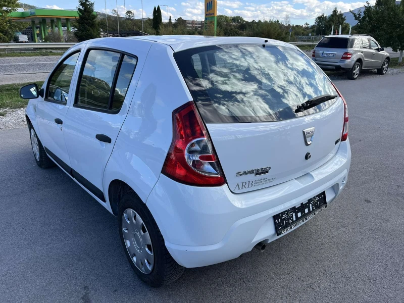 Dacia Sandero 1.4I 88кс EURO 4 КЛИМАТИК, снимка 5 - Автомобили и джипове - 47498267