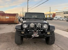 Jeep Wrangler Sahara/КОЖА/ПОДГРЕВ/ЛЕБЕДКА/CARFAX/ФИНАНСИРАНЕ, снимка 2