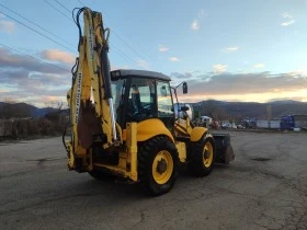      New Holland B115-