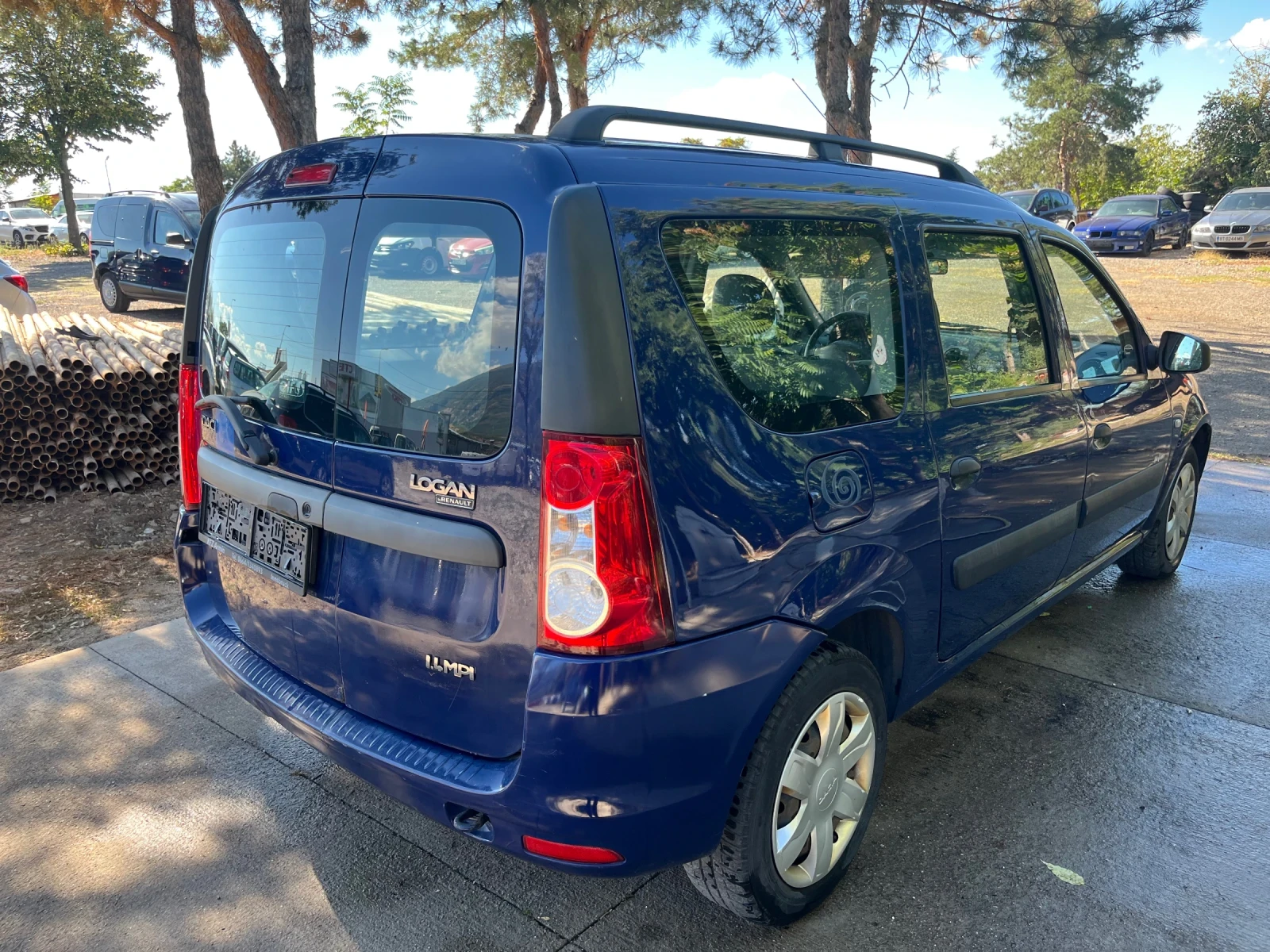 Dacia Logan 1.4i, снимка 3 - Автомобили и джипове - 56207535